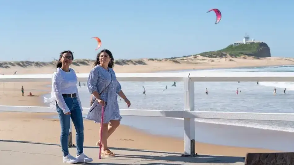 Walking along the Bathers Way at Nobbys Beach